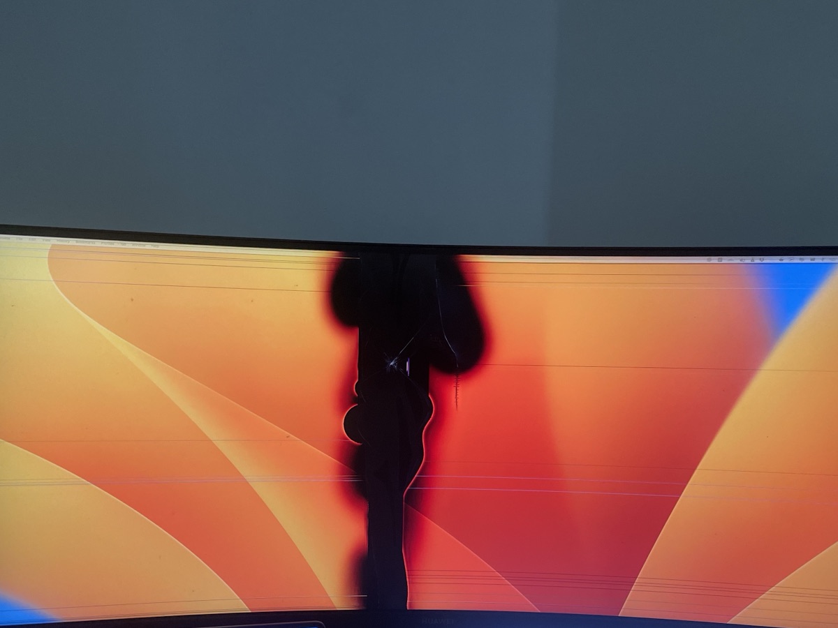 Damaged display with a dark vertical strip through the screen